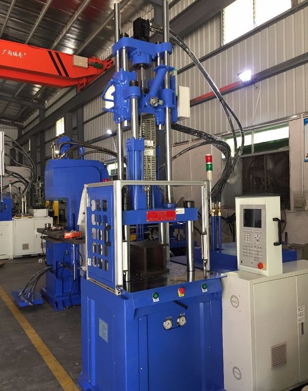 Maszyna do formowania hydraulicznego w trybie pionowym w trybie wtryskowym z 2 stołami roboczymi